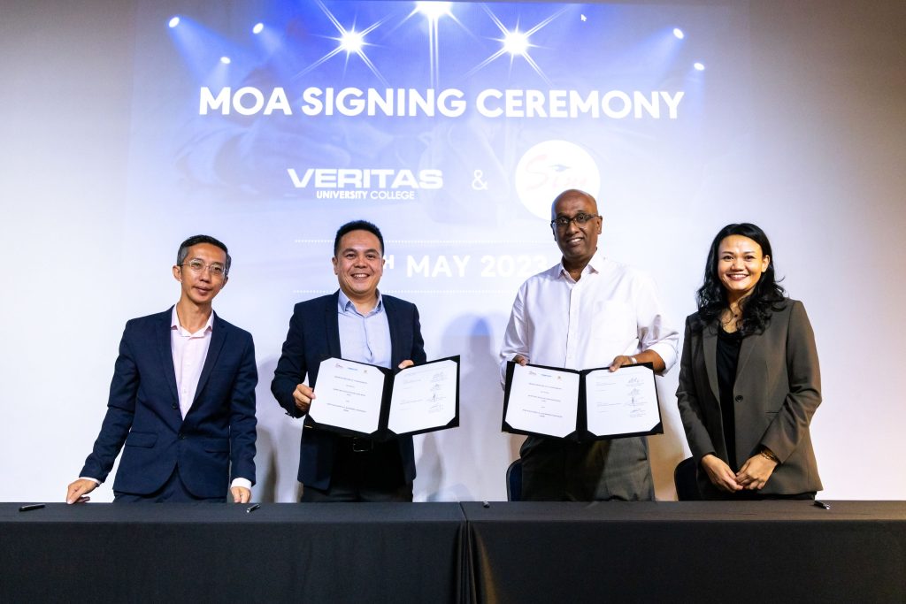 Veritas University College & SIM Education Signs MOA